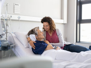Daughter visiting mother in hospital
